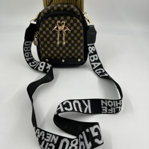 Cross body bag with design strap