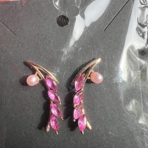 Beautiful gold plated vintage earrings set with pink gemstones and pink costume pearls