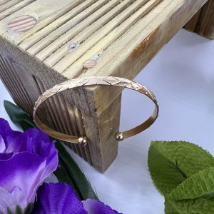 Wave design gold plated Bangle