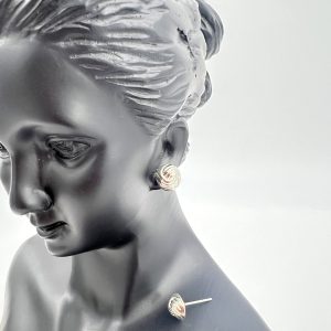 Silver toned knot like design stud earrings 1piece-colour Silver