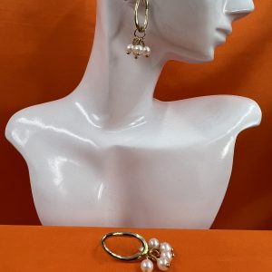 Oval shaped earrings with faux pearl cluster