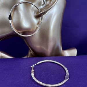 Large hoop earrings with decorative design