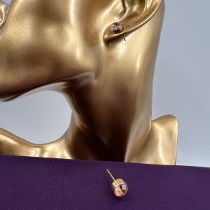 Stud earrings set with gemstone