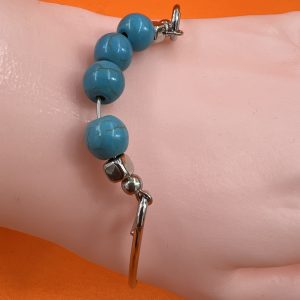 Bangle with turquoise bead design