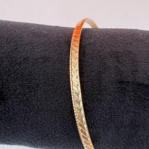 Bangle with block and dot design