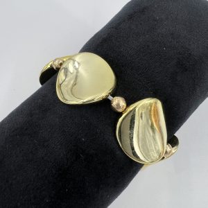 Wavy style disc shaped bracelet