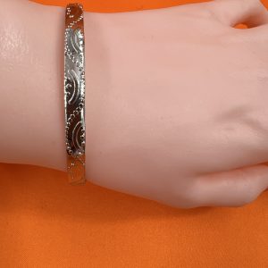 Bangle with decorative design
