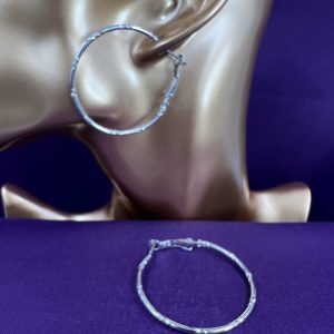 Medium size hoop earrings with decorative design