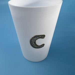 Small tin plastic cup